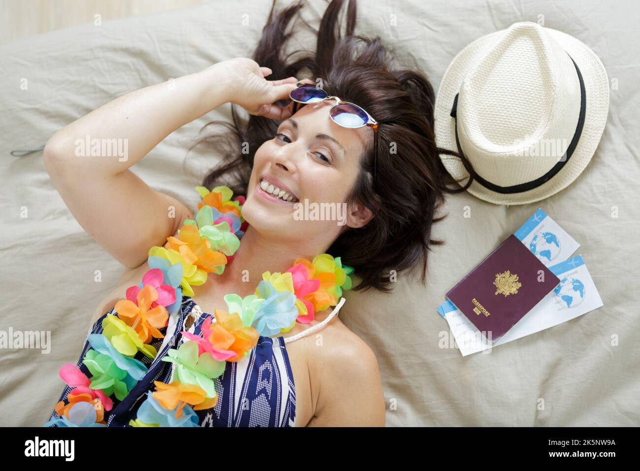 Woman surrounded clothes accessories hi-res stock photography and ...