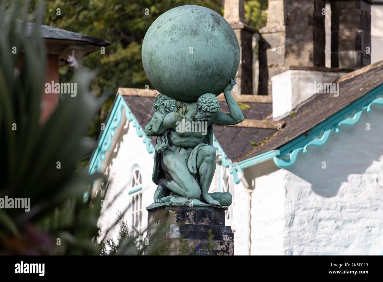 Statue of hercules carrying the world on his shoulders in Portmeirion, Gwnydd, North Wales on 3 Ocotber 2022 Stock Photo