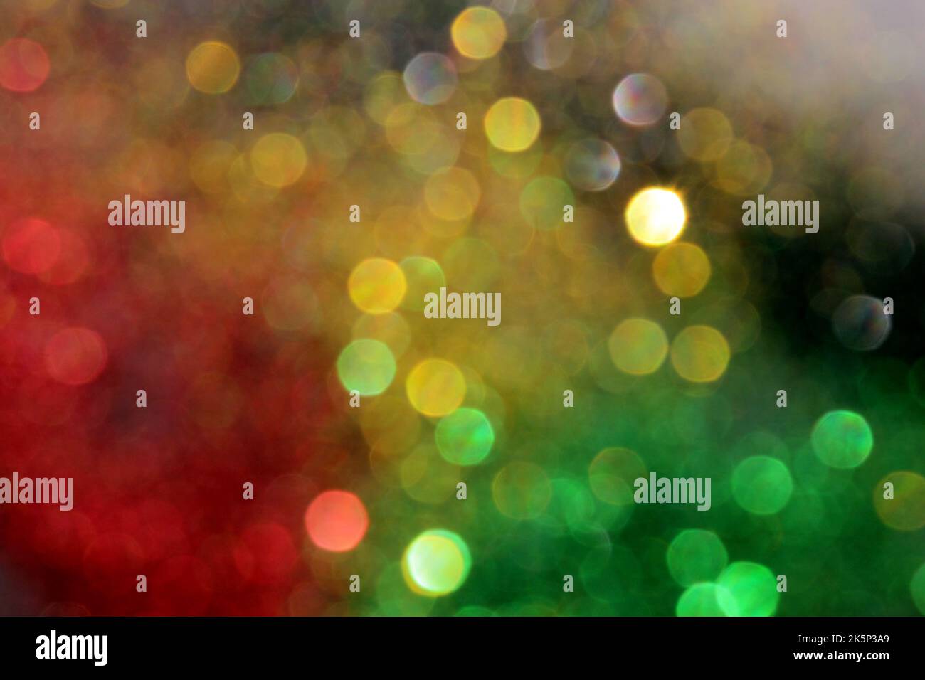 Black History Month concept. Abstract green yellow and red color glitter sparkle background. Space for your text. Stock Photo