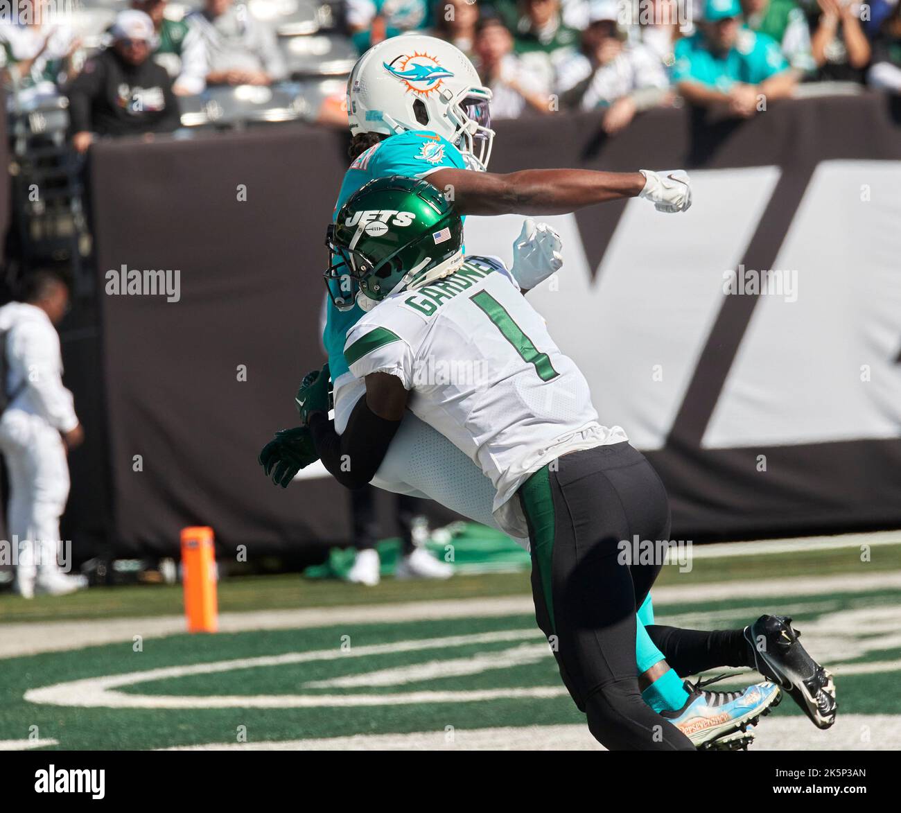 East Rutherford, New Jersey, USA. 9th Oct, 2022. Miami Dolphins quarterback Teddy  Bridgewater (5) is tackled by New York Jets cornerback Sauce Gardner (1) in  the end zone and called for a