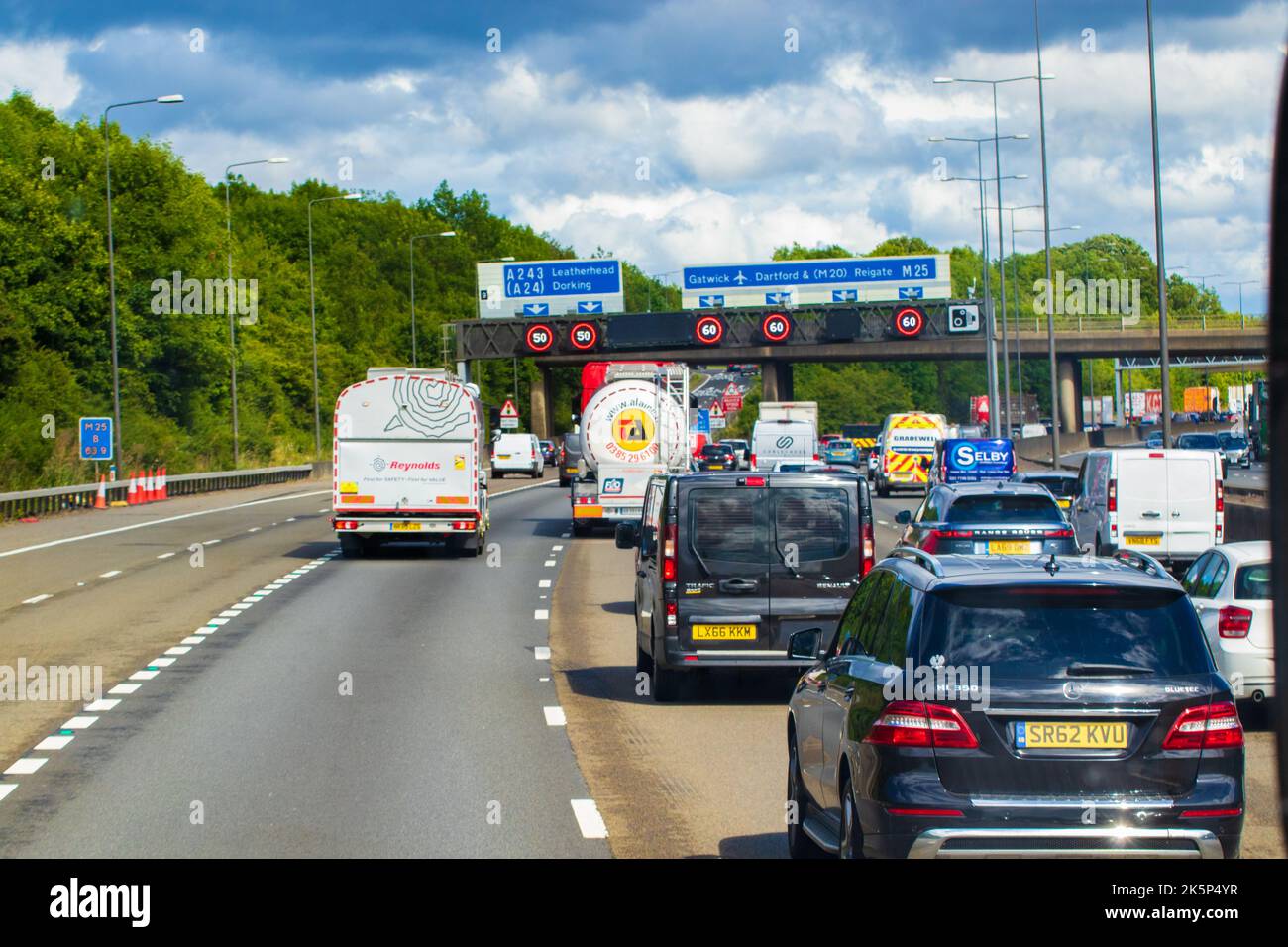 Heavy traffic on M25.The M25 or London Orbital Motorway is a major road encircling most of 