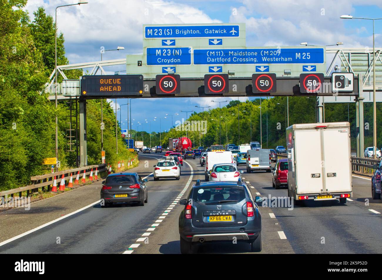 Heavy traffic on M25.The M25 or London Orbital Motorway is a major road encircling most of 