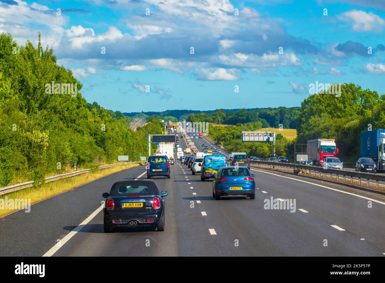 Heavy traffic on M25.The M25 or London Orbital Motorway is a major road encircling most of 