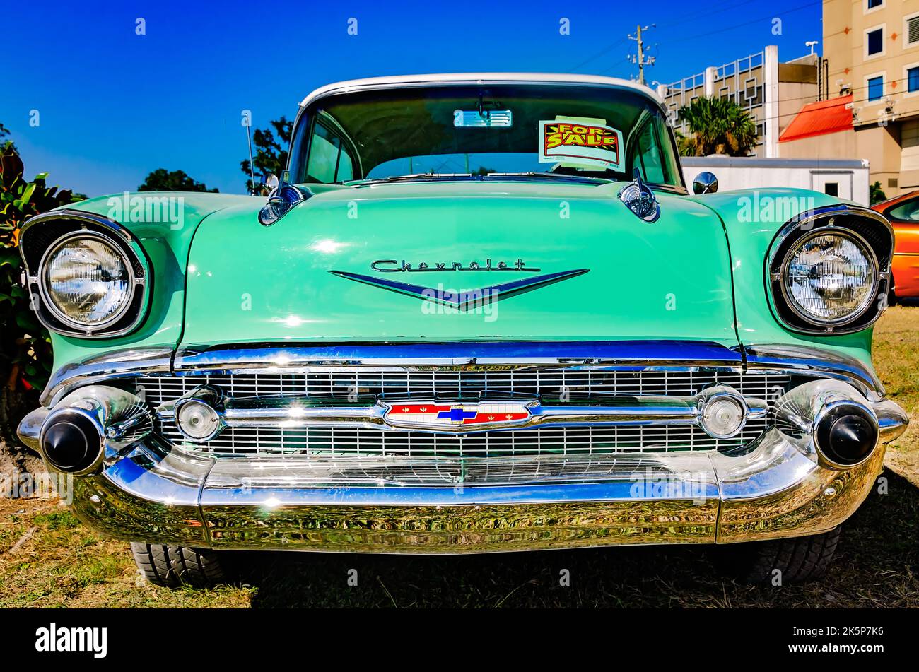 A 1957 Chevrolet Bel Air is displayed on Highway 90 during the 26th annual Cruisin’ the Coast antique car festival in Biloxi, Mississippi. Stock Photo