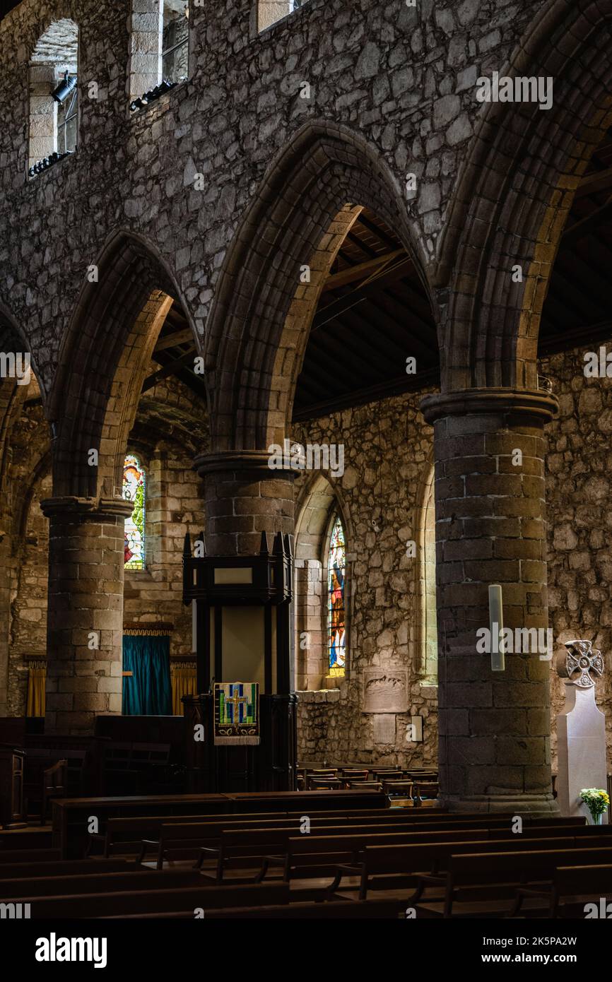 Innerwick Church The interior of Ancient Church Cathedral with pillars, arches, and ...