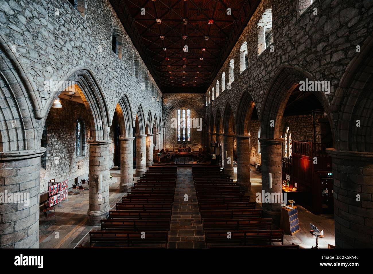 Innerwick Church The interior of Ancient Church Cathedral with pillars, arches, and ...