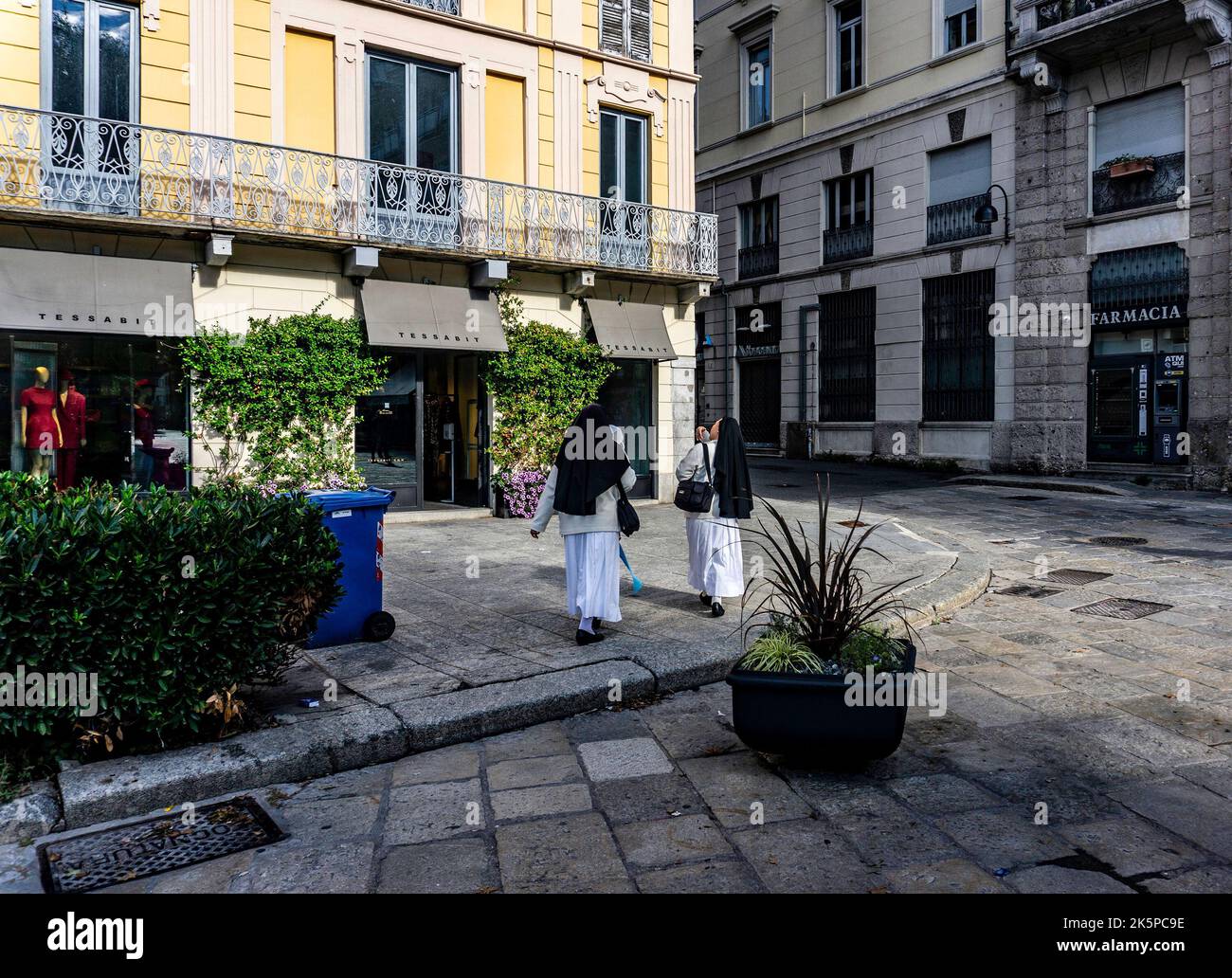 Two members of The Missionaries of Charity, an order of nuns, on the streets of Como, Italy. Stock Photo