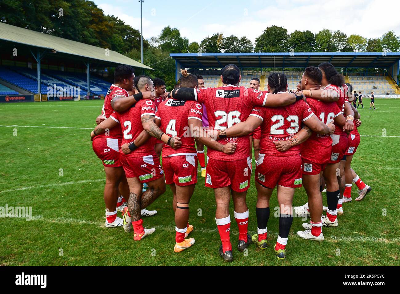 Halifax, England 8th October 2022 Tonga team huddle after win. Rugby