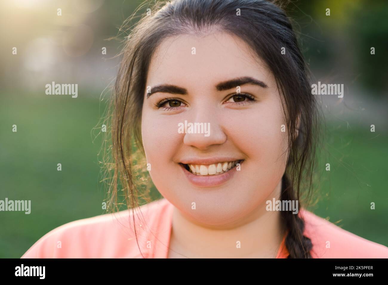 smiling woman overweight people happy plus size Stock Photo