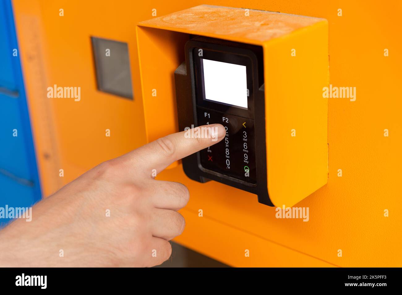 Finger dials pin code on terminal. Transaction pay and shopping concept