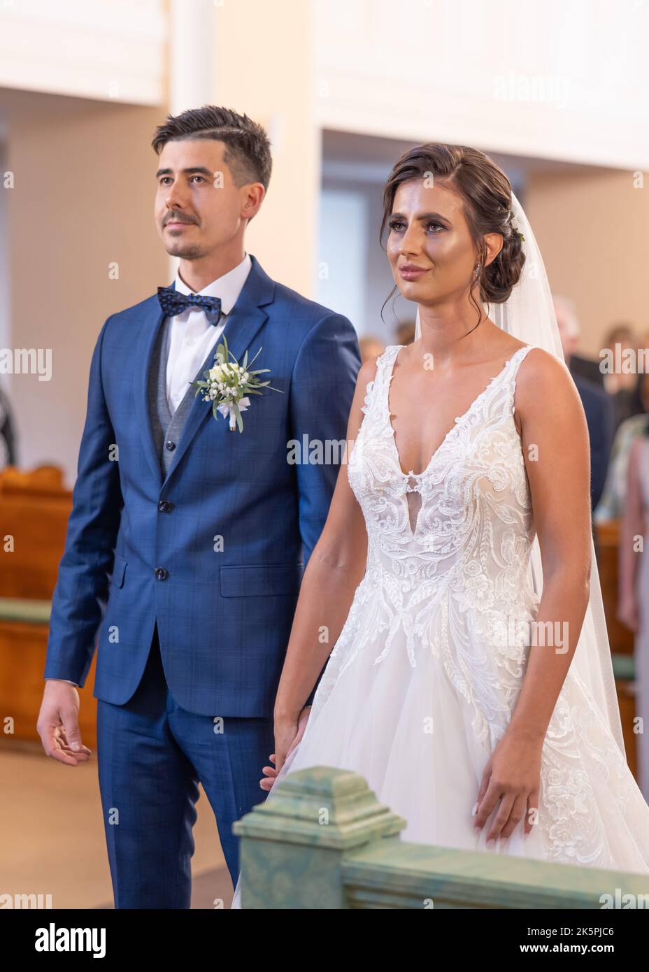 Groom and bride altar hi-res stock photography and images - Alamy