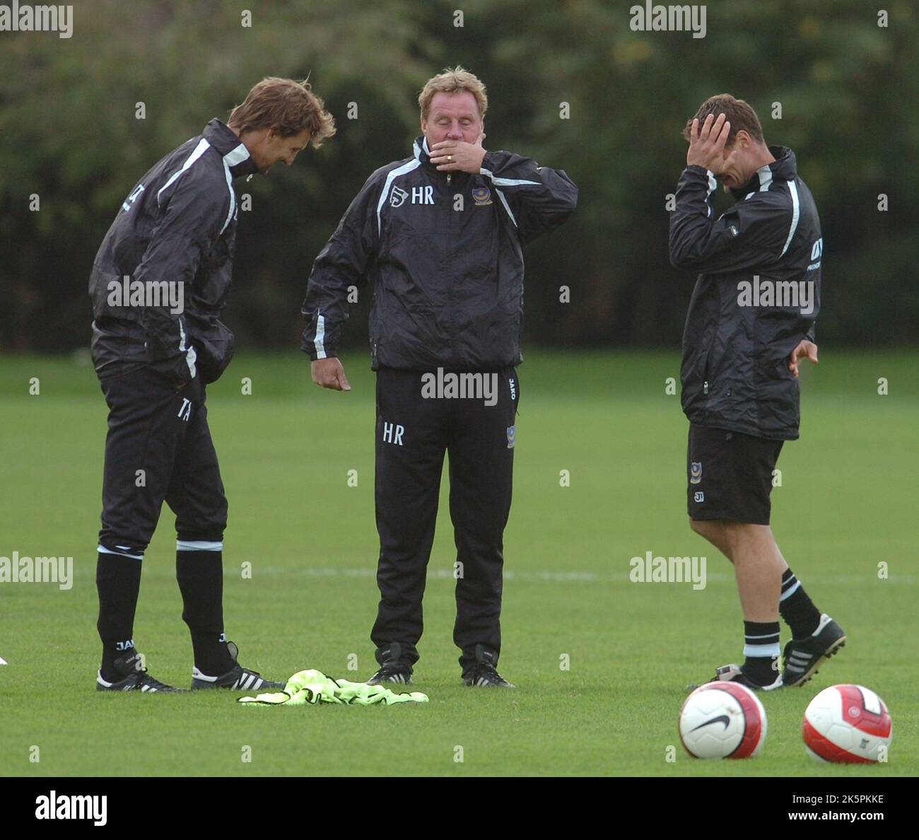 PORTSMOUTH TRAINING MANAGER HARRY REDKNAPP AND HIS ASSISTANT TONY ADAMS