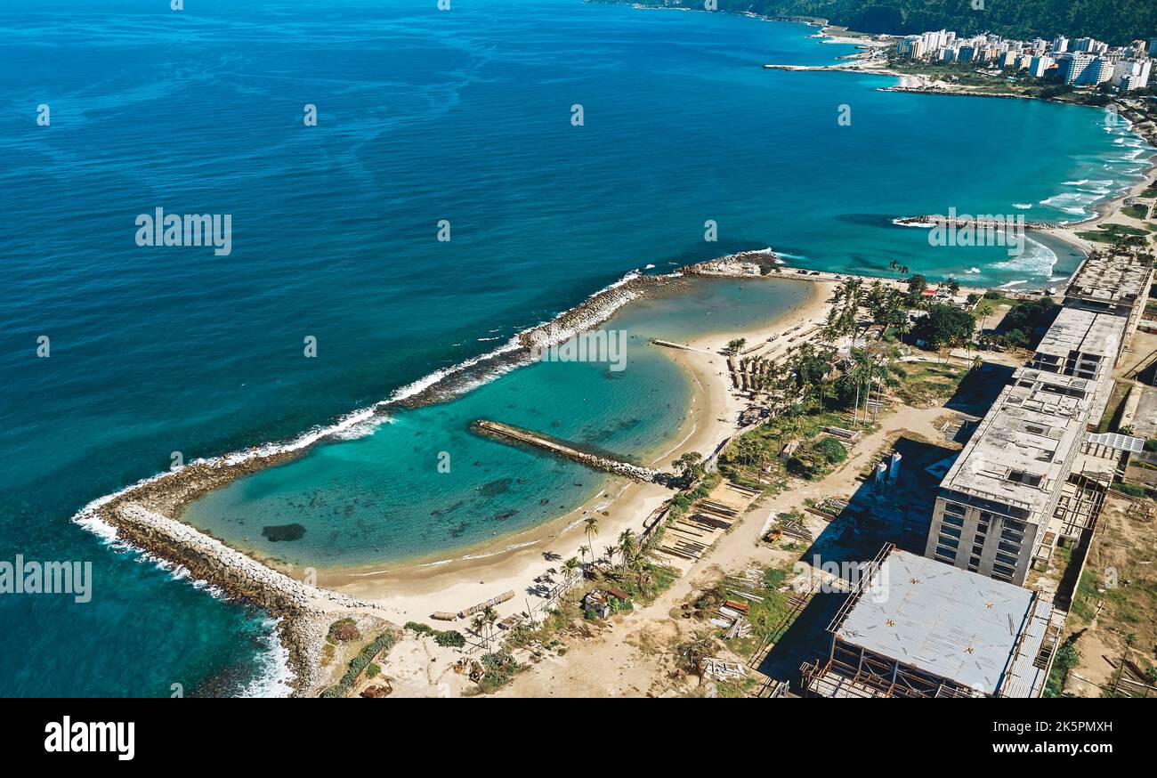 Aerial view the old beach and structure of The Macuto Sheraton hotel built in 1961 and located in front of the Caribbean Sea. Caraballeda, Venezuela. Stock Photo