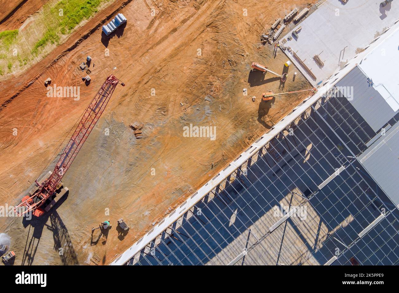 In warehouses of construction site steel framework is being constructed from metal steel Stock Photo