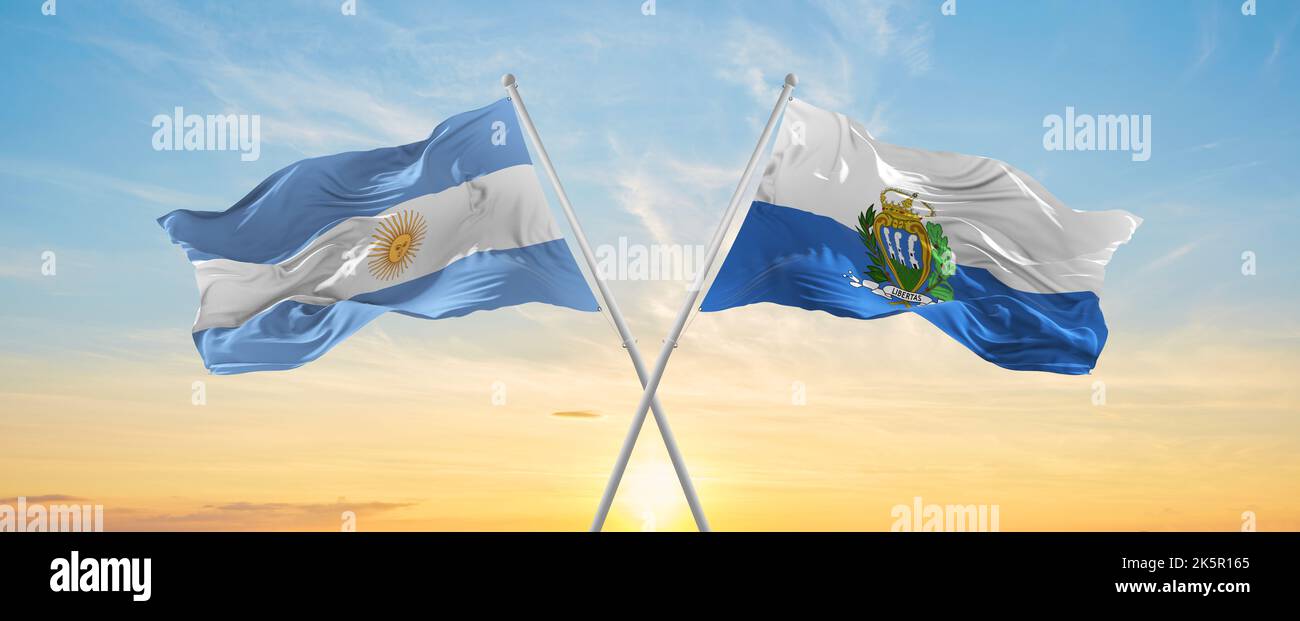 crossed national flags of Argentine and San Marino flag waving in wind ...