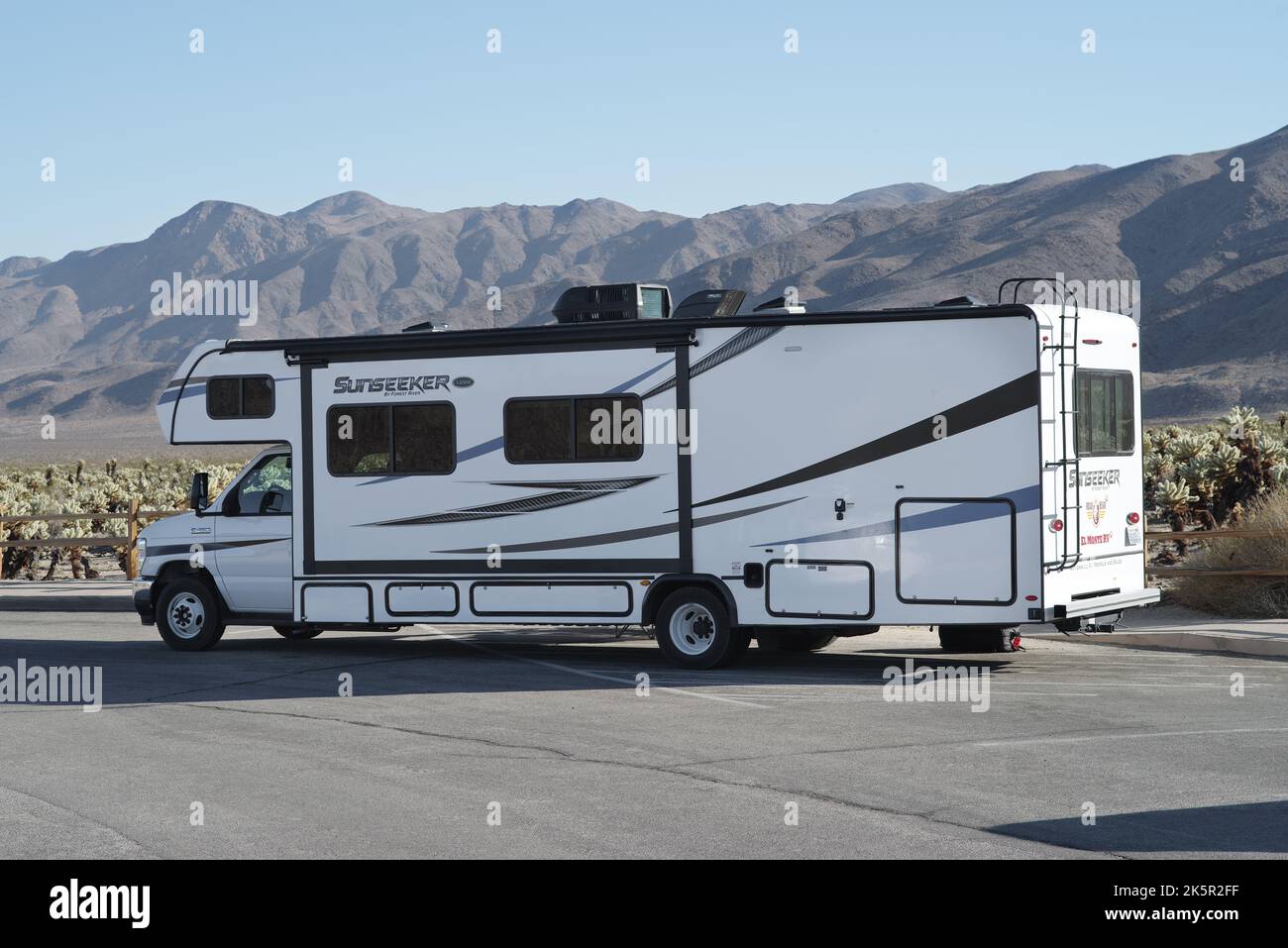Joshua Tree National Park, California, United States - January 19, 2022: Recreational vehicle shown parked by the Cholla Cactus Garden Nature Trail. Stock Photo