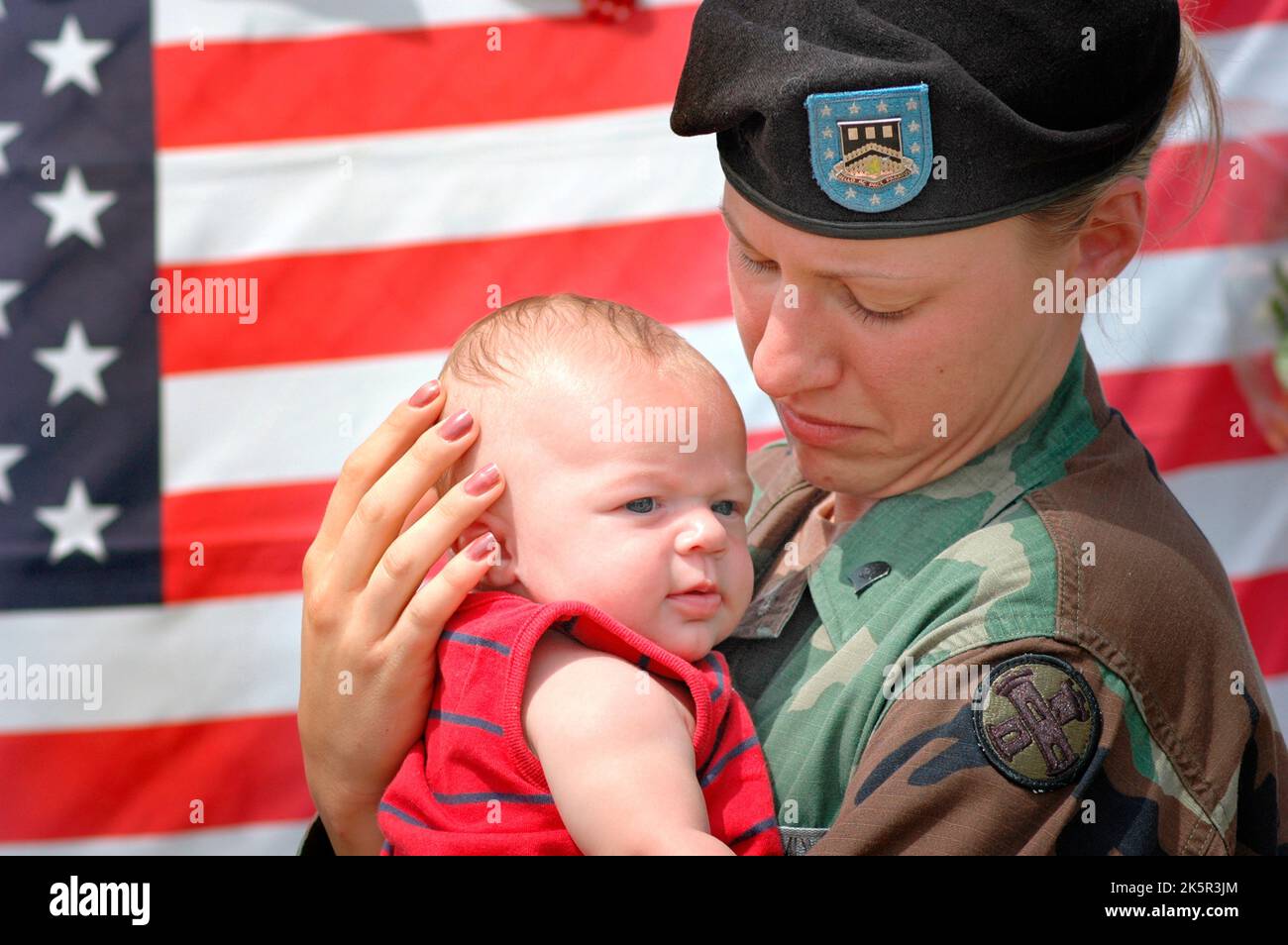 Female soldier at site of memorial of 14 dead Marines in Brook Park