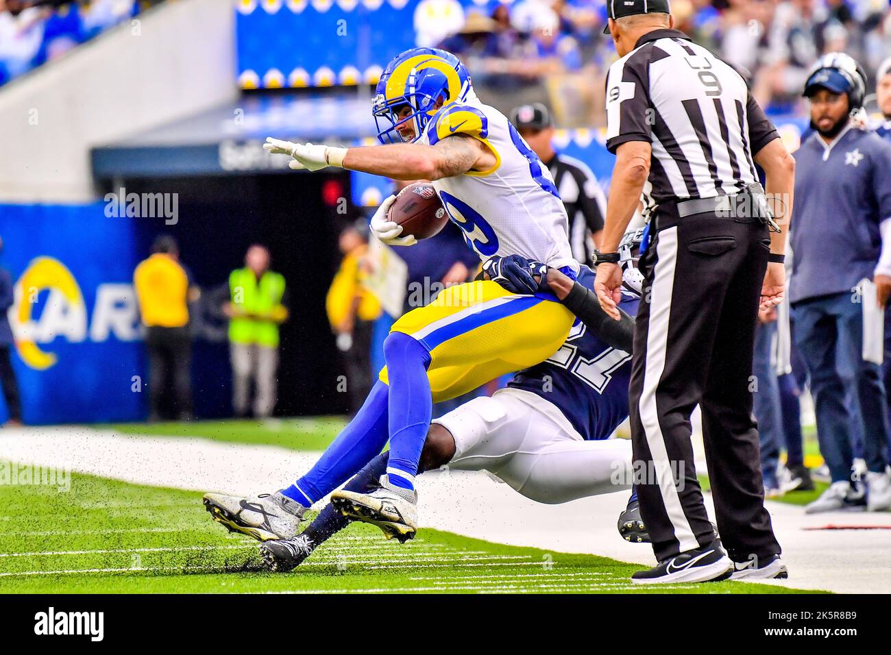 November 13, 2022 Inglewood, CA.Los Angeles Rams tight end Tyler Higbee #89  catches the pass, tackled by Arizona Cardinals linebacker Ben Niemann #56  in action in the second quarter during the NFL