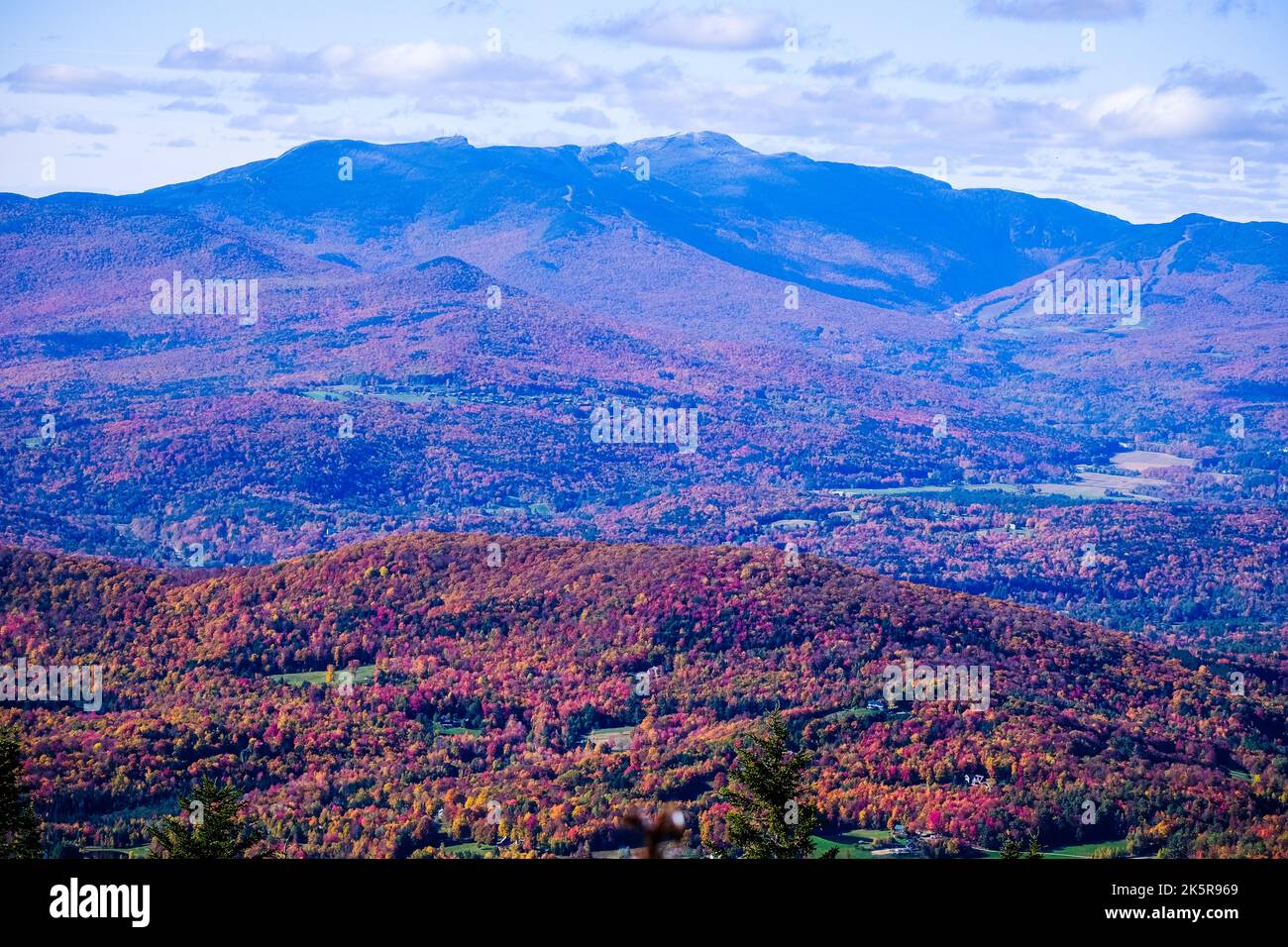 The vibrant colors of autumn foliage surround White Rock Mountain in