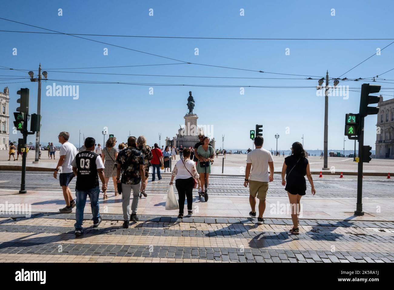 Lisbon, Portugal. 23rd Sep, 2022. People are seen walking around Praca de Comercio square in the Baixa district, Lisbon. Portugal has registered 14,852 SARS-CoV-2 coronavirus infections, 45 covid-19-associated deaths and a slight reduction in hospital admissions between September 27 and October 3, the Directorate General of Health (DGS) reported Friday. Hospital occupancy and mortality due to covid-19 remain stable in the country. (Credit Image: © Jorge Castellanos/SOPA Images via ZUMA Press Wire) Stock Photo