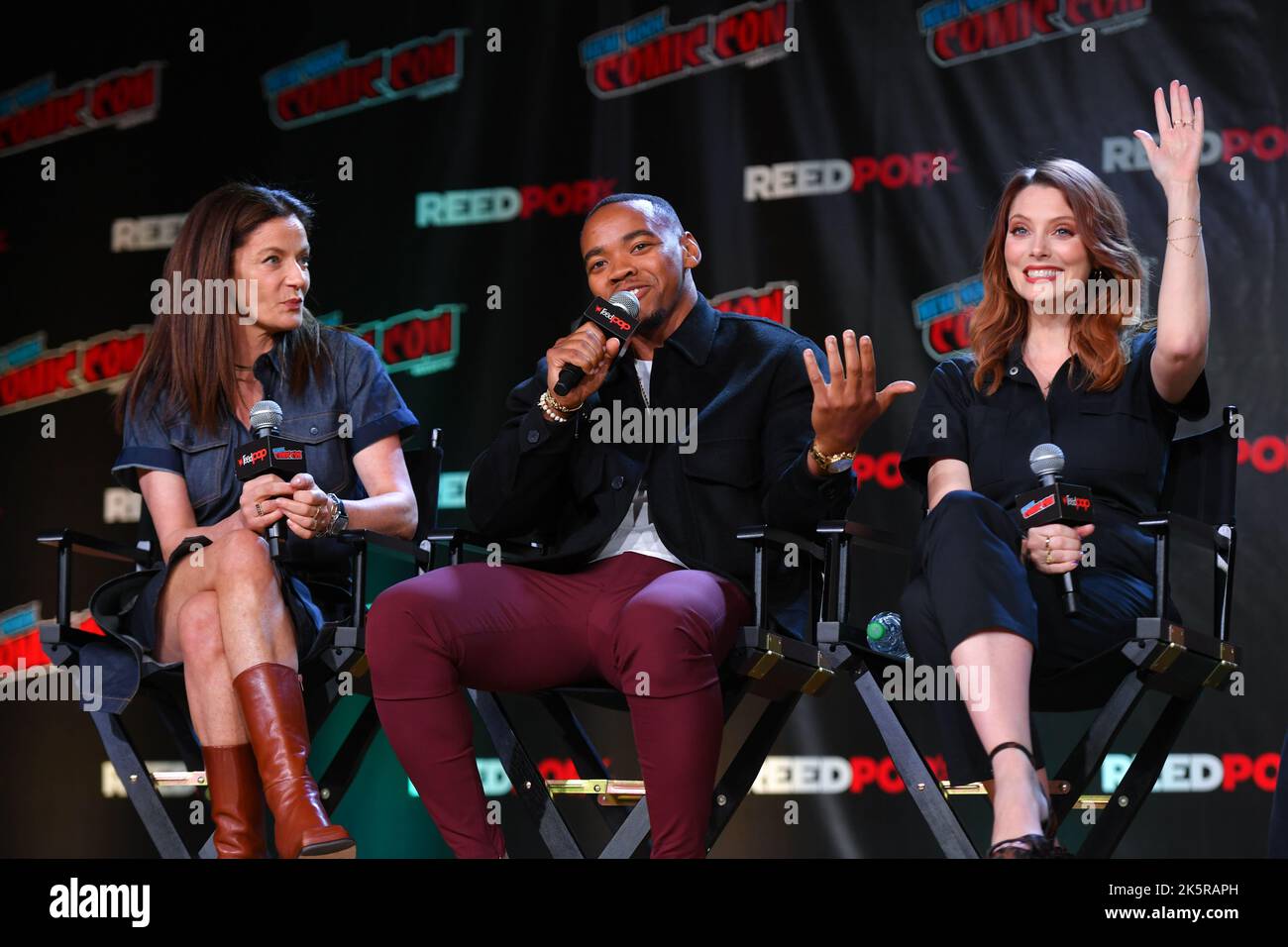 Michelle Gomez, Joivan Wade and April Bowlby speak onstage at HBO Max and DC's Doom Patrol and Titans panel during New York Comic Con 2022 on October Stock Photo