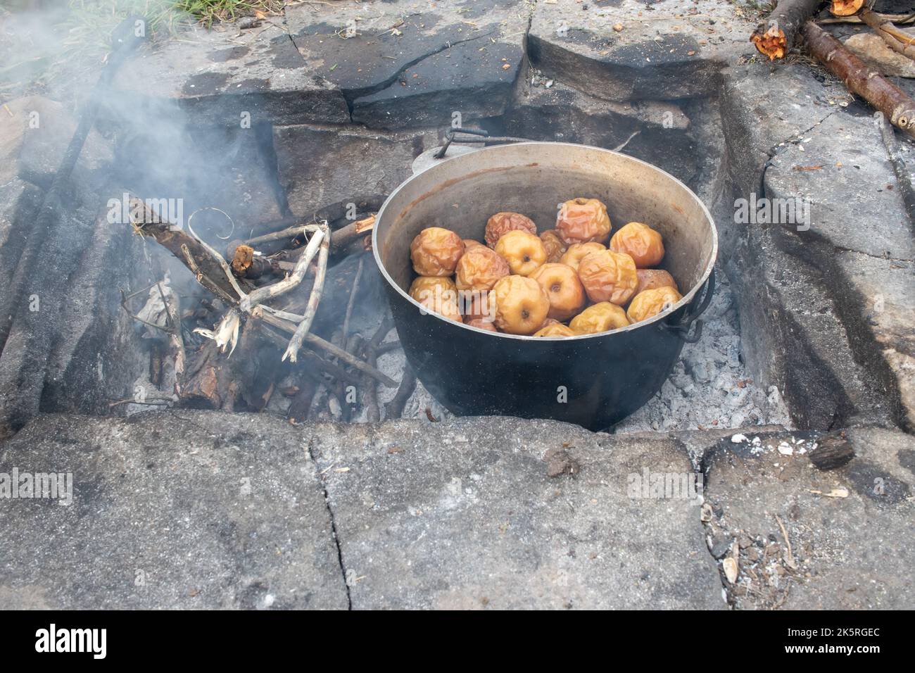 Campfire Baked Apples. Traditional apple cooking in a cast iron