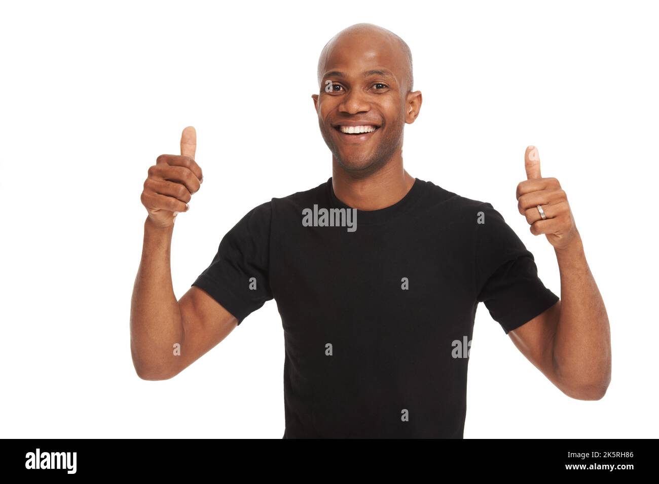 Excellent job. Studio portrait of a handsome african american man giving the thumbs up isolated on white. Stock Photo