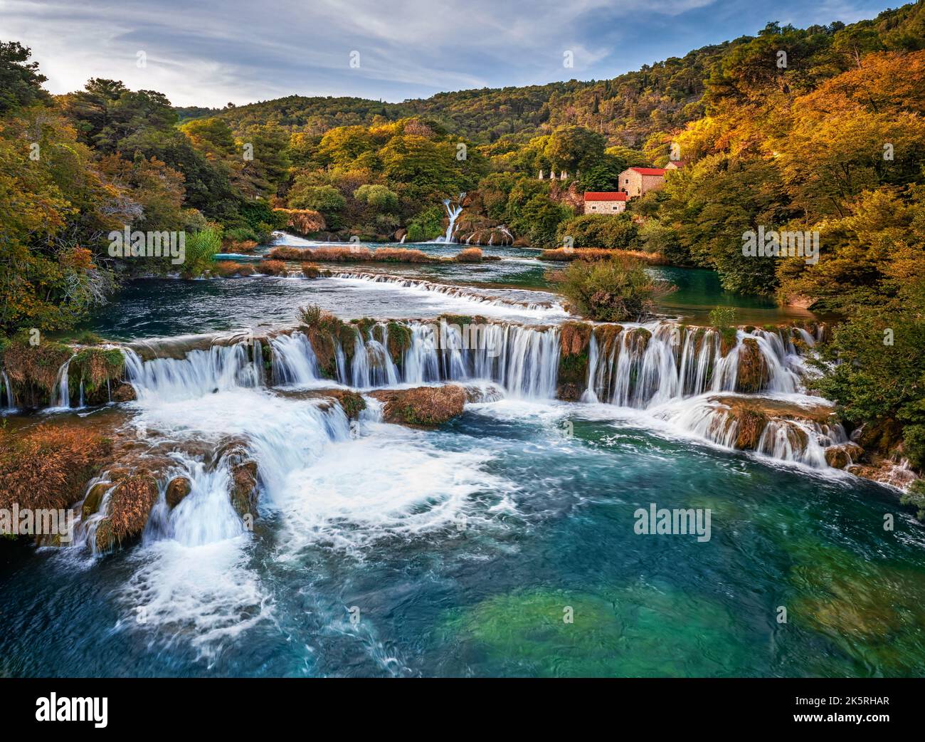Krka, Croatia - Aerial view of the famous Krka Waterfalls in Krka National Park on a bright autumn morning with colorful autumn foliage, turquoise wat Stock Photo