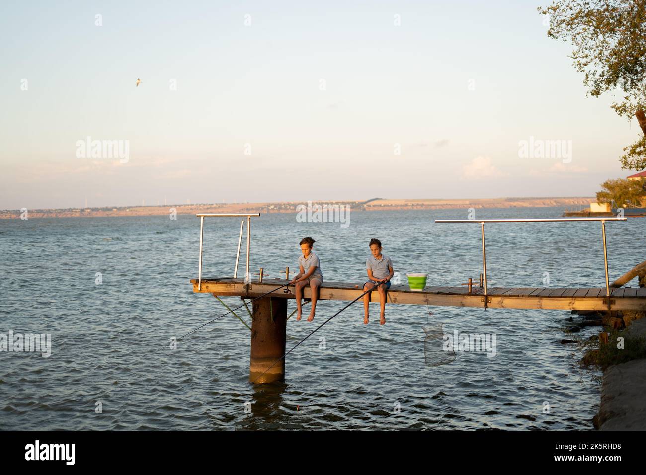 Two boys fishing hi-res stock photography and images - Alamy