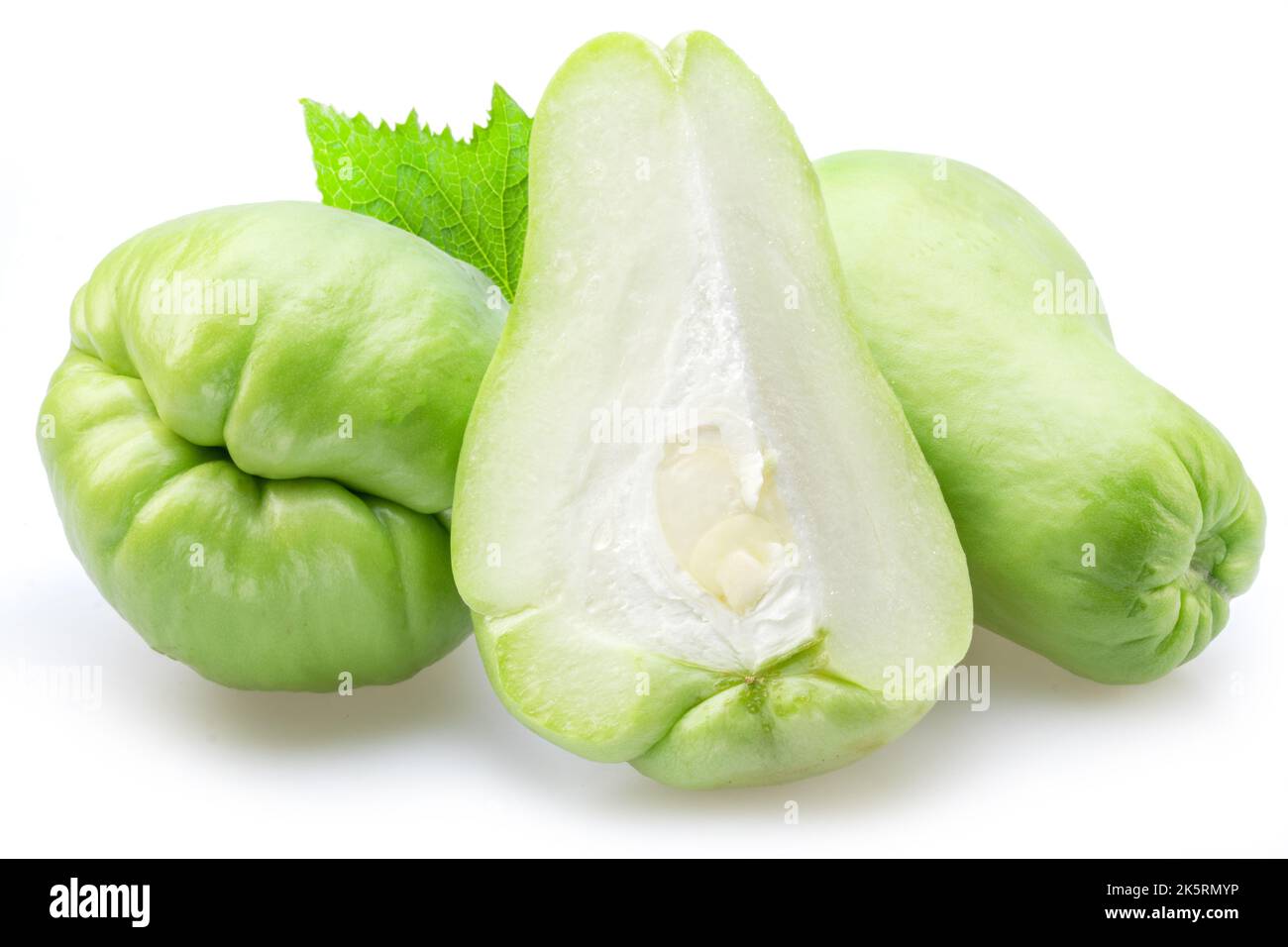 Chayote fruit and half of chayote fruit isolated on white background. Stock Photo