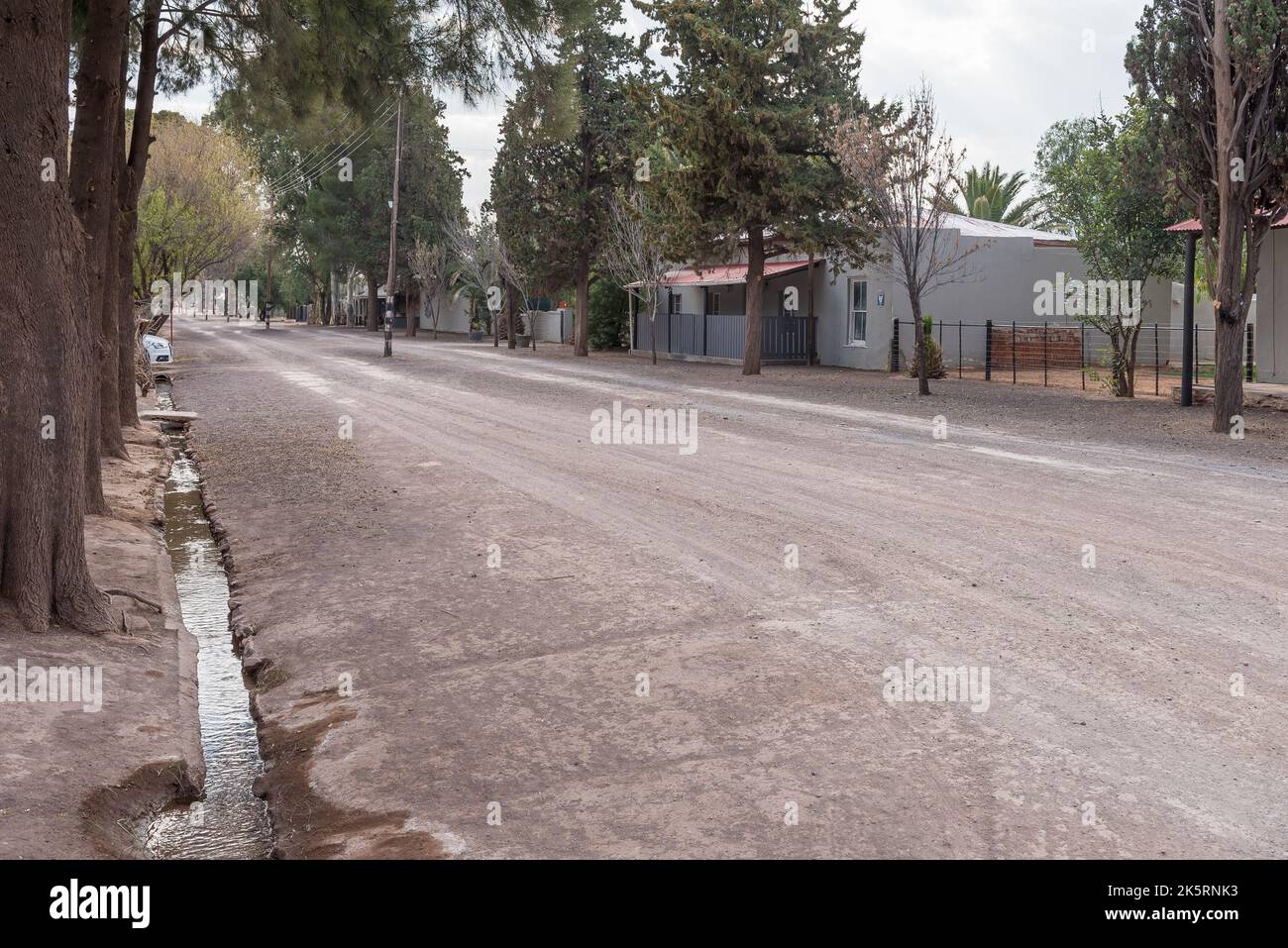 LOXTON, SOUTH AFRICA SEP 2, 2022 A gravel street scene, with houses