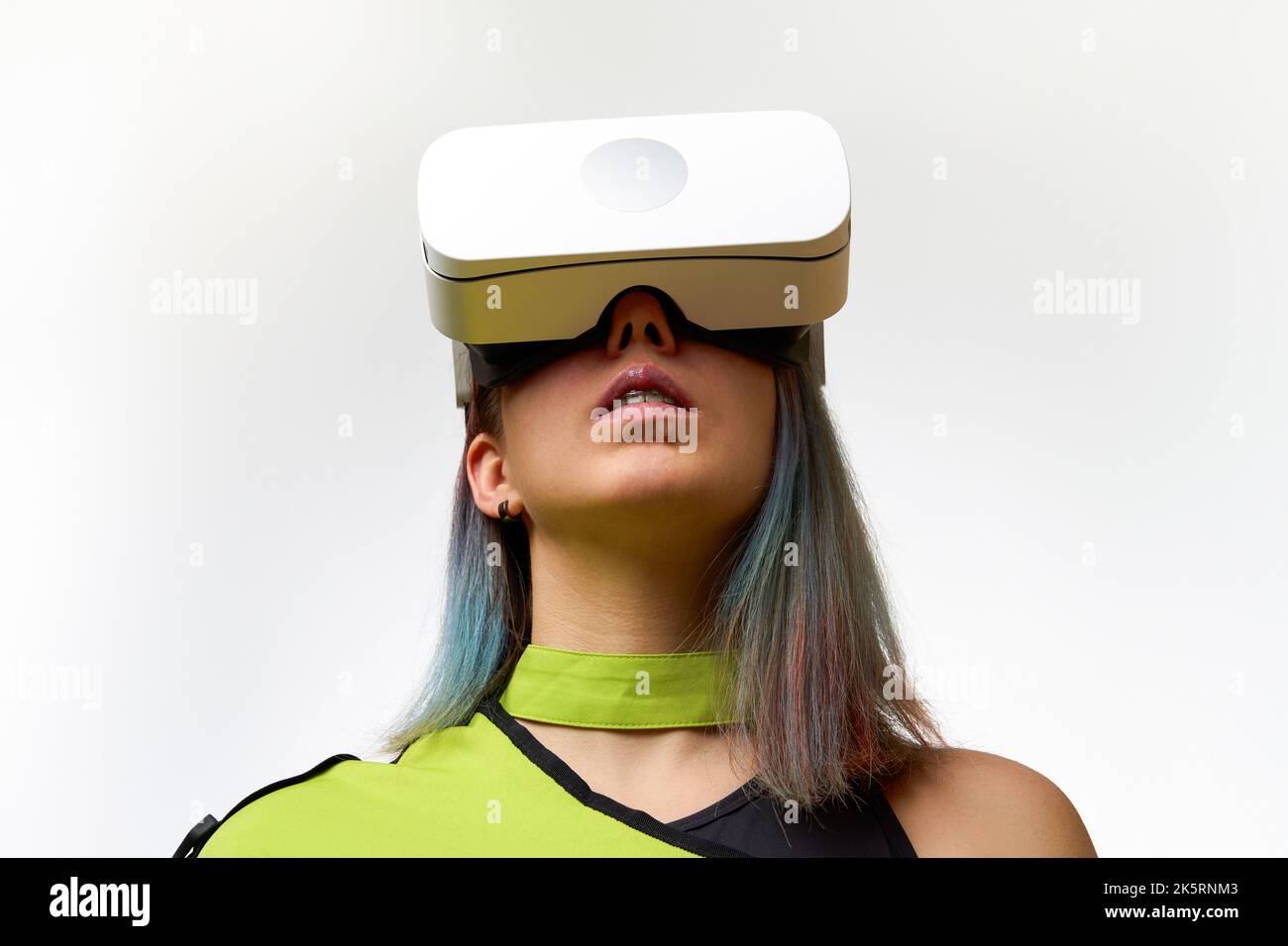 Woman is using virtual reality headset. Concept of virtual, augmented ...