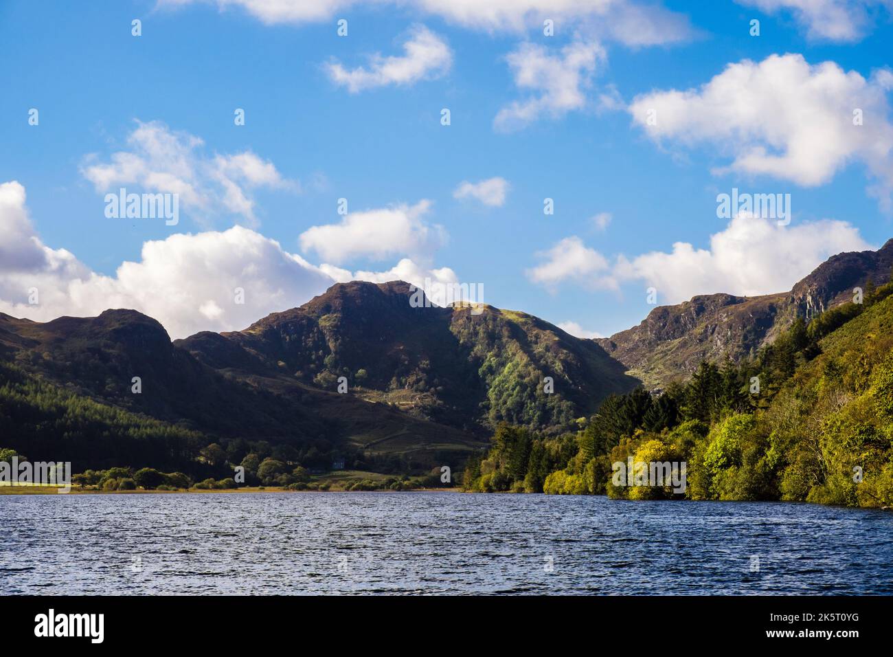 View across the choppy waters of Llyn Crafnant lake to Crimpiau in Snowdonia National Park. Betws-Y-Coed, Conwy, north Wales, UK, Britain Stock Photo