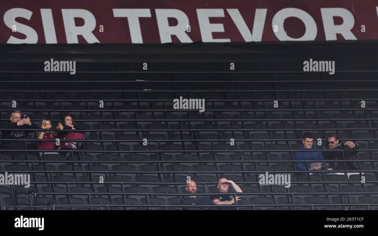 A few fans arrive early in the Sir Trevor Brooking stand before the Premier league match between West Ham United and Fulham at the London Stadium. 9th Oct 2022 Stock Photo