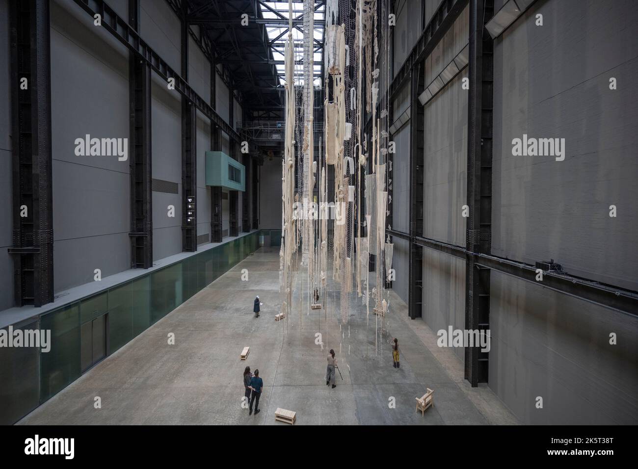 Tate Modern, London, UK. 10 October 2022. A new sculptural work within the iconic surrounds of Tate Modern’s Turbine Hall is unveiled. This ambitious installation has been devised by artist Cecilia Vicuña for the 2022 Hyundai Commission and runs from 11 October 2022-16 April 2023. Credit: Malcolm Park/Alamy Live News Stock Photo