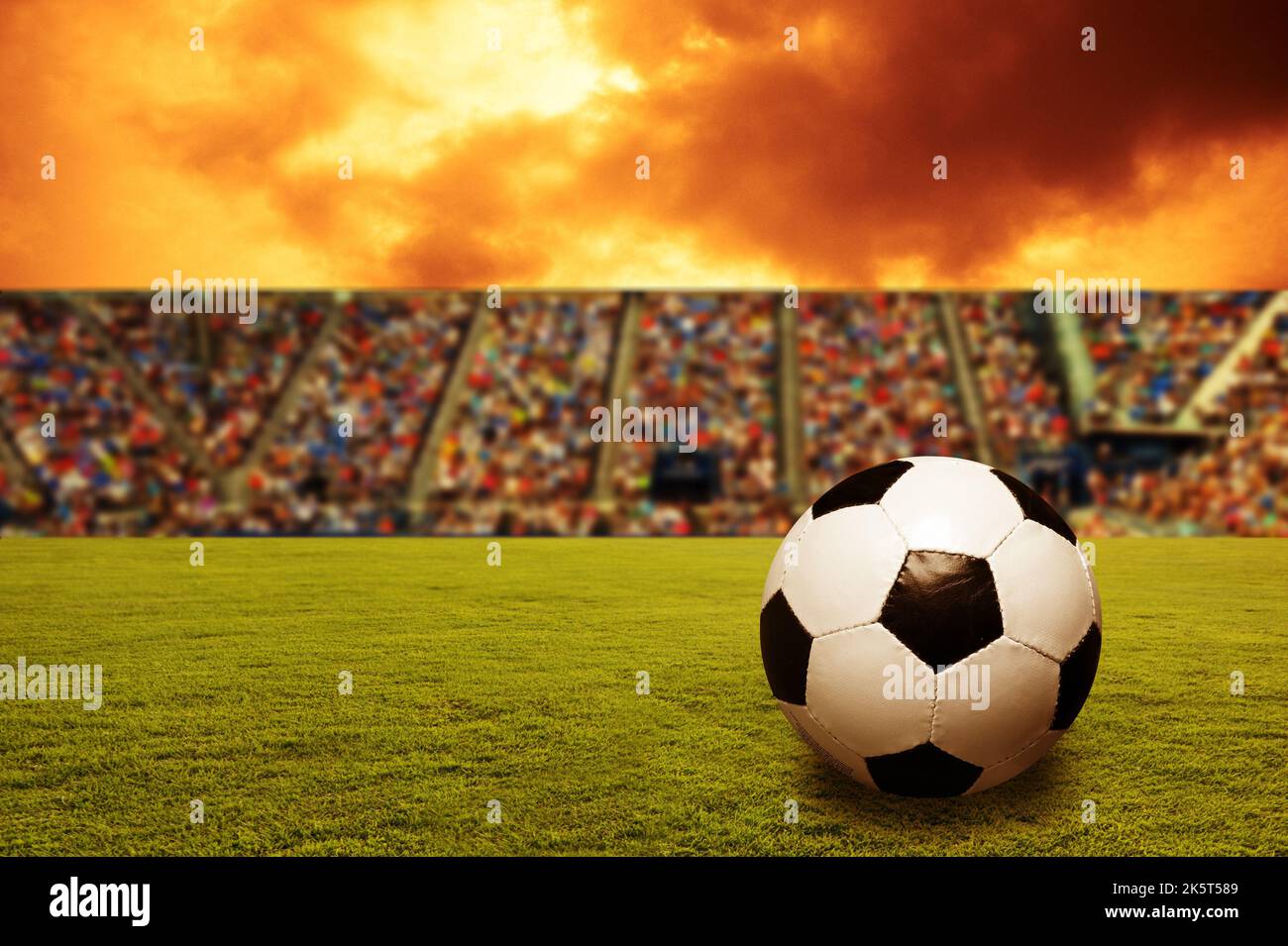 soccer ball on a pitch inside a stadium Stock Photo Alamy