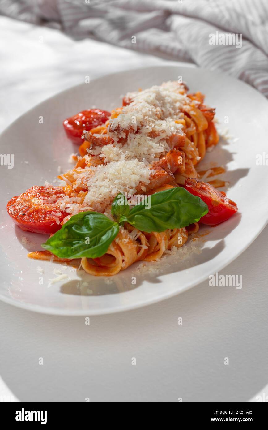 Homemade Bucatini, Amatriciana Pasta with bacon, cherry tomatoes and