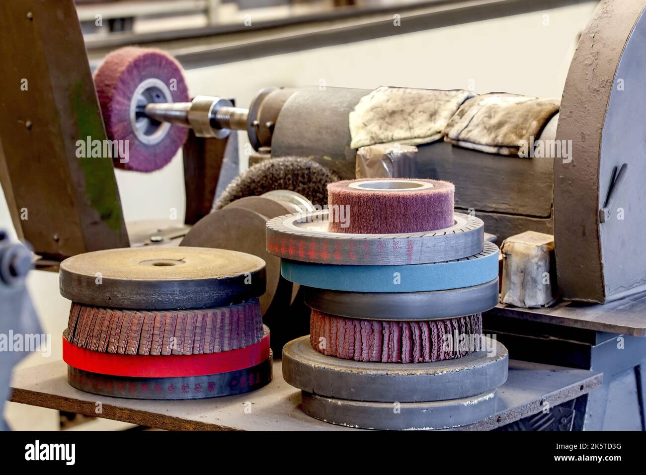 knife sharpening machine and master. Grinding machine. grinding knife using  abrasive stone Stock Photo - Alamy