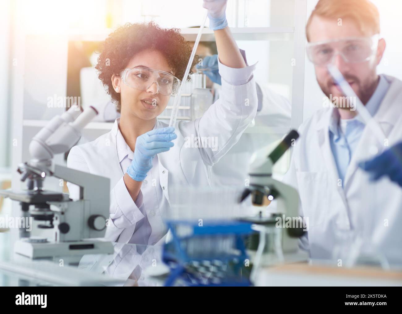 Team of Medical Research Scientists Working on Generation Experimental ...