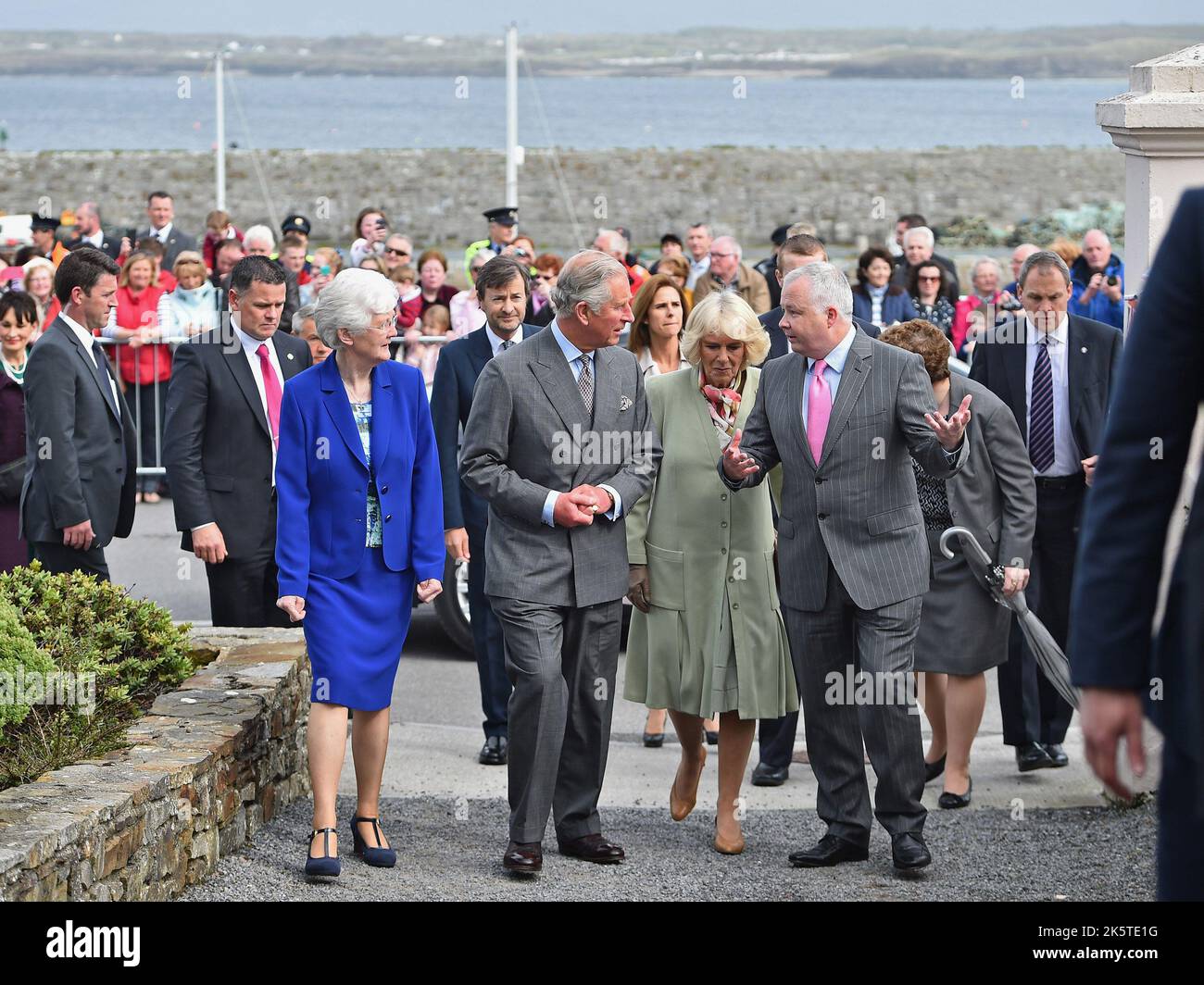 File photo dated 20/05/15 of the King and Queen Consort, the then Prince of Wales and Duchess of Cornwall, meeting members of the local community in the peace garden during a visit to Mullaghmore, Sligo, where Lord Mountbatten was killed whilst on his boat. The King has sent a message of condolence to the President of Ireland following the deaths of 10 people in an explosion at a petrol station in Co Donegal. Issue date: Monday October 10, 2022. Stock Photo
