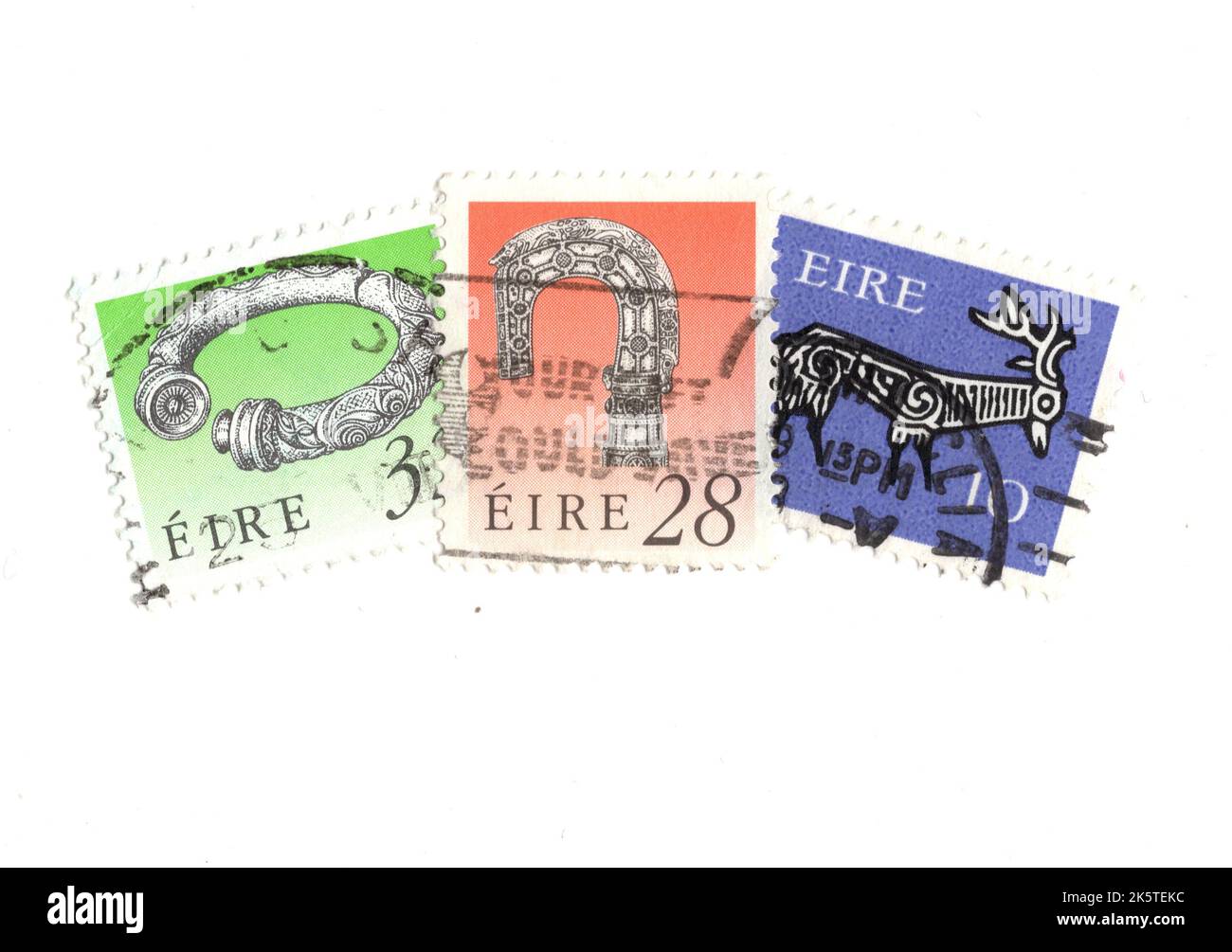 A montage of vintage postage stamps from Ireland on a white background