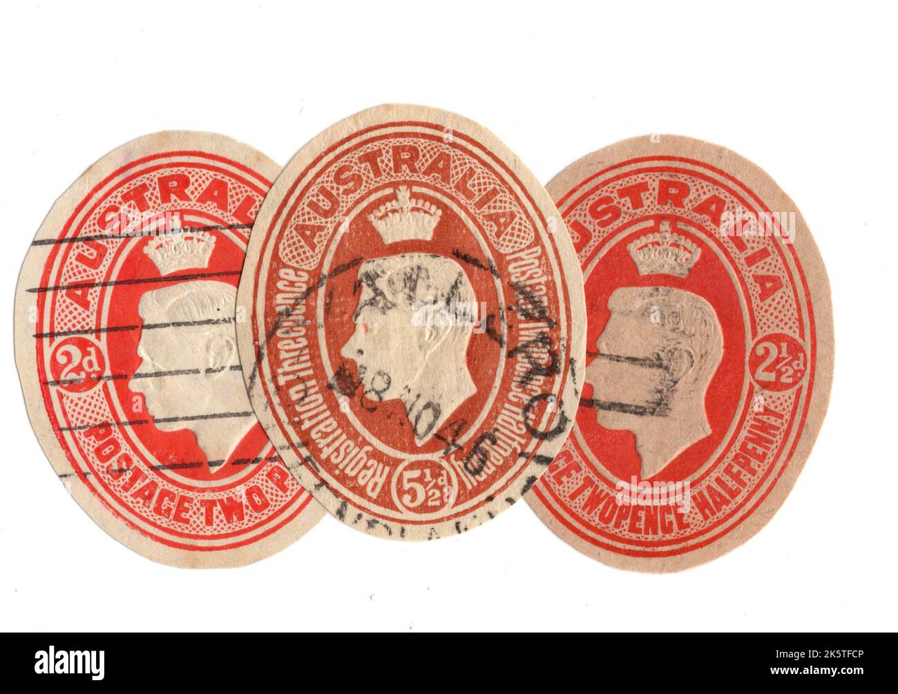 A montage of vintage embossed postage stamps from Australia on a white