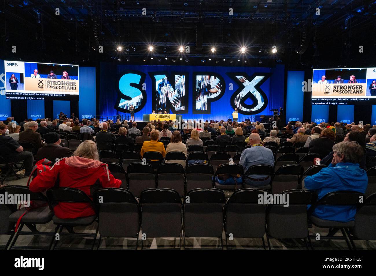 Aberdeen, Scotland, UK. 10th October 2022. Delegates listen to panel session at  the Scottish National Party Conference on day three in Aberdeen, Scotland. Because of the Covid pandemic this year is the first time Scottish National Party Members have met for a conference since October 2019. Iain Masterton/Alamy Live News Stock Photo
