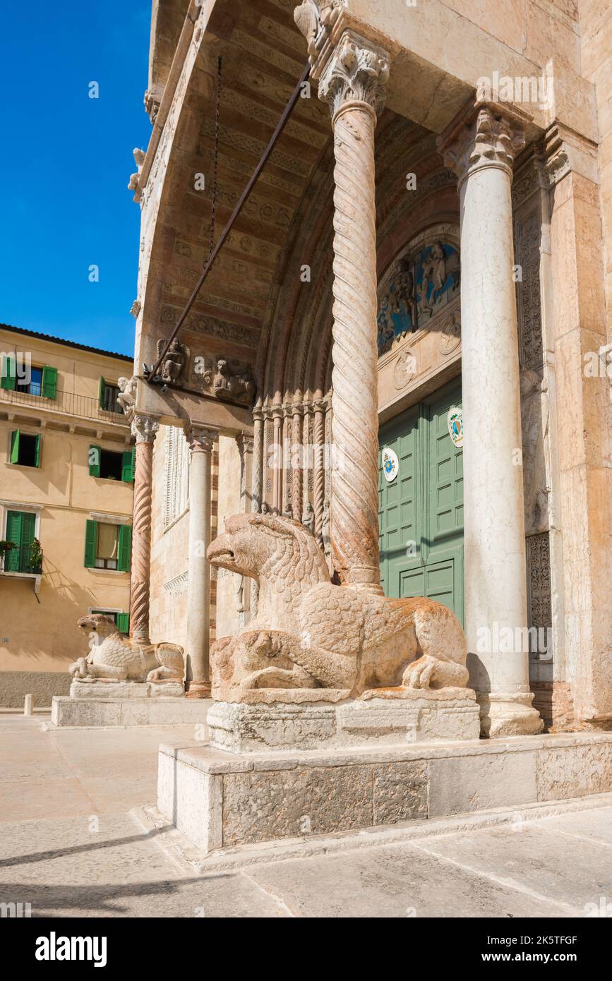 Verona Italy Piazza Duomo, view of a pair of 12th Century marble griffins in the Piazza Duomo guarding the west entrance of the city Cathedral, Verona Stock Photo