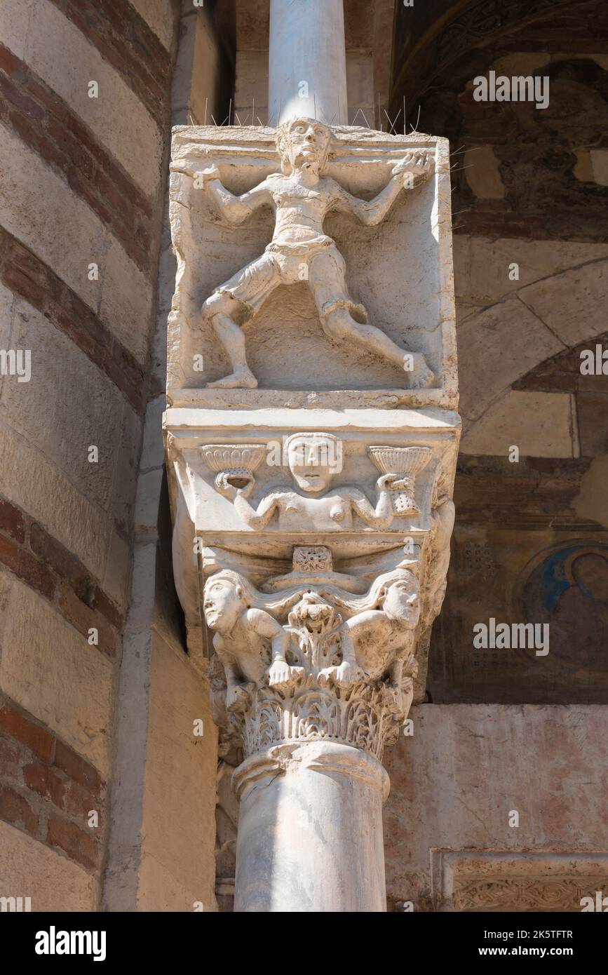 Cathedral Verona, view of a 12th century carved figure surmounting a marble pillar at the south door of the Duomo in the historic center of Verona Stock Photo