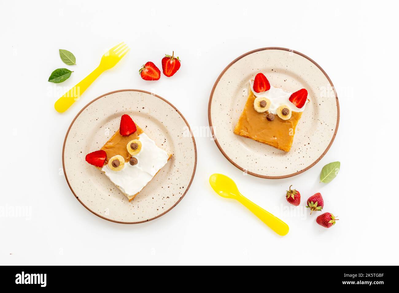 Childrens fox face sandwiches toast bread with peanut butter and strawberries Stock Photo Alamy