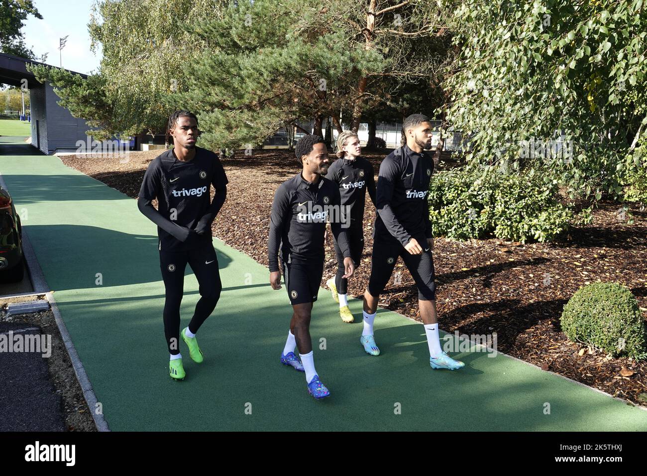 Cobham, Surrey, UK. 10th Oct, 2022. Chelsea Football Club players walk out for training at the clubsÕ Cobham training base, for their Champions League game against AC Milan tomorrow in Italy Here : Carney Chukwuemeka, Raheem Sterling and Ruben Loftus Cheek and Connor Gallagher Credit: Motofoto/Alamy Live News Stock Photo