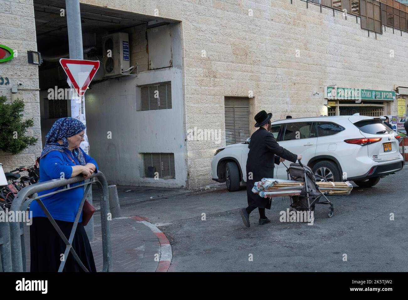 Jerusalem, Israel September 28th, 2022 A man using a baby stroller