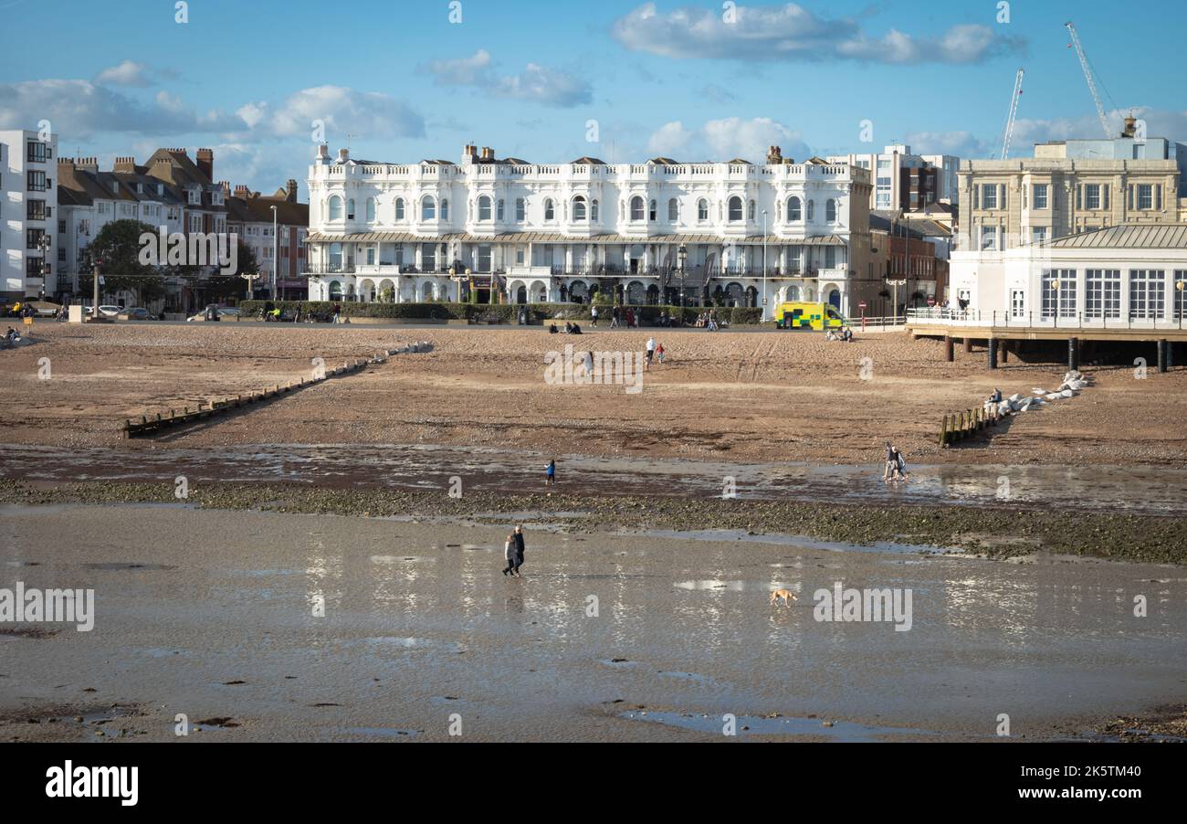 Regency buildings on the seafront at Worthing in West Sussex, UK, seen from Worthing Pier. Stock Photo