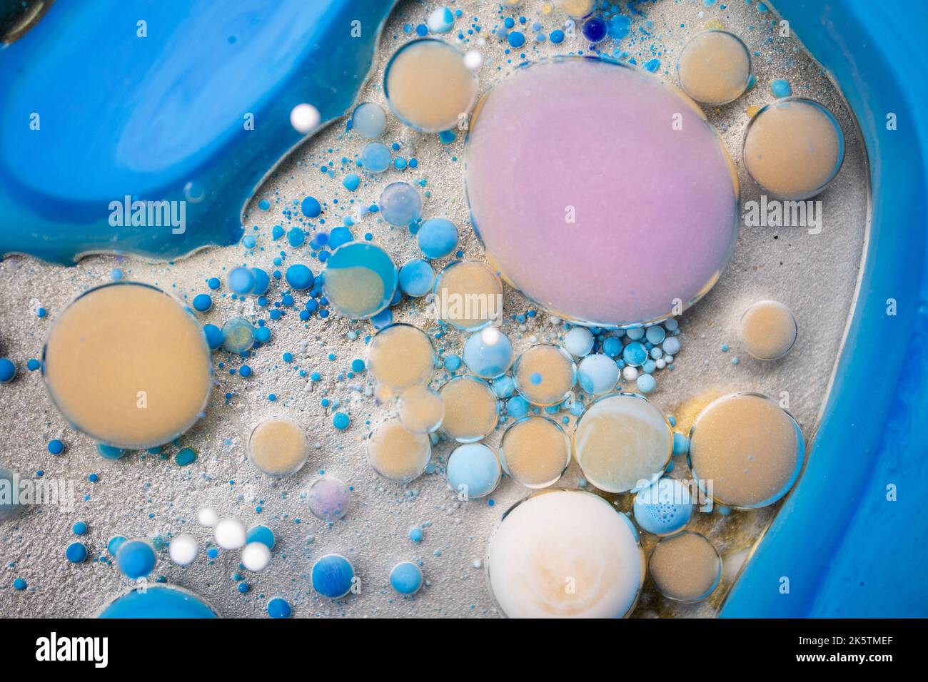 Colorful Bright Bubbles Oil Beautiful Paint Universe Color Moving Multicolored. Space Universe, Quantum Physics. Fantastic Hypnotic Surface.  Stock Photo